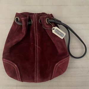 Coach suede mini drawstring wristlet w/dust bag.